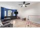 Bright living room with L-shaped sofa and ample natural light at 9331 S 33Rd Gln, Laveen, AZ 85339