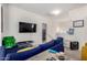 Cozy living room featuring a TV and comfortable seating at 9331 S 33Rd Gln, Laveen, AZ 85339