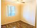 Bedroom with wood flooring and a window with natural light at 10136 E Southern Ave # 1110, Mesa, AZ 85209