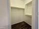 The walk-in closet features built-in shelving and hard surface floors at 10136 E Southern Ave # 1110, Mesa, AZ 85209