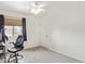 Bright bedroom with carpeted floors and a window at 10359 W Sunflower Pl, Avondale, AZ 85392