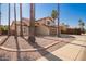 Two-story house with three-car garage and palm trees at 10359 W Sunflower Pl, Avondale, AZ 85392