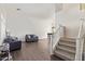 Open living and dining area with hardwood floors at 10359 W Sunflower Pl, Avondale, AZ 85392