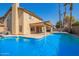 Relaxing pool area with spacious patio and covered area at 10359 W Sunflower Pl, Avondale, AZ 85392