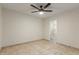 Bedroom with tile floors, ceiling fan and en-suite bathroom at 1122 W Dragoon Ave, Mesa, AZ 85210