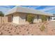 Brick home with a low maintenance rock front yard at 1122 W Dragoon Ave, Mesa, AZ 85210