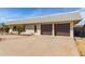 Two-car garage and a long driveway at 1122 W Dragoon Ave, Mesa, AZ 85210