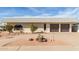 Ranch-style home with two car garage and landscaping at 1122 W Dragoon Ave, Mesa, AZ 85210