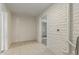 Laundry area with tile flooring and access to additional space at 1122 W Dragoon Ave, Mesa, AZ 85210