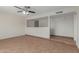 Living room with tiled floors and half wall at 1122 W Dragoon Ave, Mesa, AZ 85210