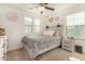 Bedroom featuring a queen-size bed and a ceiling fan at 11695 N 166Th Ln, Surprise, AZ 85388