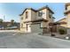 Two-story house with attached garage and basketball hoop at 11695 N 166Th Ln, Surprise, AZ 85388