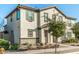 Two-story house with light-colored exterior, landscaping, and a gated entryway at 11695 N 166Th Ln, Surprise, AZ 85388