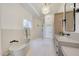 Spa-like bathroom with walk-in shower and freestanding tub at 11776 N 119Th St, Scottsdale, AZ 85259