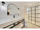 Stylish bathroom with modern vanity and frameless shower at 11776 N 119Th St, Scottsdale, AZ 85259