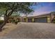 Beautiful home with a three-car garage and desert landscaping at 11776 N 119Th St, Scottsdale, AZ 85259