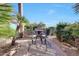 Outdoor patio with seating area and a built-in fire pit at 11776 N 119Th St, Scottsdale, AZ 85259