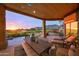 Large covered patio, with a dining area and stunning sunset views at 11776 N 119Th St, Scottsdale, AZ 85259