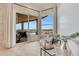 Relaxing sitting area with sliding glass doors to patio and pool at 11776 N 119Th St, Scottsdale, AZ 85259