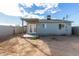 Backyard view of house with patio and wall at 1208 E Hess Ave, Phoenix, AZ 85034