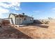 Backyard view of house with covered patio at 1208 E Hess Ave, Phoenix, AZ 85034