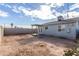 Backyard view of house with patio and wall at 1208 E Hess Ave, Phoenix, AZ 85034