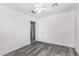 Simple bedroom with gray flooring and ceiling fan at 1208 E Hess Ave, Phoenix, AZ 85034