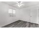 Simple bedroom with gray flooring and window coverings at 1208 E Hess Ave, Phoenix, AZ 85034