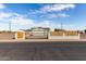 House exterior with gate and driveway at 1208 E Hess Ave, Phoenix, AZ 85034