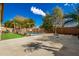 Spacious backyard with a pool, putting green, and basketball court at 12759 W Eagle Ridge Ln, Peoria, AZ 85383