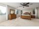 Spacious bedroom with wood furniture and ceiling fan at 12759 W Eagle Ridge Ln, Peoria, AZ 85383