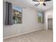 Bedroom with carpet, ceiling fan, and window with gray curtains at 12759 W Eagle Ridge Ln, Peoria, AZ 85383