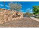 Sunset Park community entrance with stonework and landscaping at 12759 W Eagle Ridge Ln, Peoria, AZ 85383