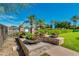 Relax by the inviting pool with lush landscaping at 12759 W Eagle Ridge Ln, Peoria, AZ 85383