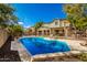 Stunning pool and patio area with a large backyard at 12759 W Eagle Ridge Ln, Peoria, AZ 85383