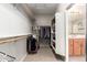 Spacious walk-in closet with shelving and hanging rods at 12759 W Eagle Ridge Ln, Peoria, AZ 85383