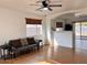 Bright living room featuring hardwood floors and a view into the kitchen at 1302 E 30Th Ave, Apache Junction, AZ 85119