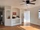 Living room with built-in shelving and hardwood floors at 1302 E 30Th Ave, Apache Junction, AZ 85119