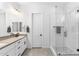 Modern bathroom features a glass-enclosed shower, stylish vanity, and sleek fixtures at 1332 E Sierra Vista Dr, Phoenix, AZ 85014