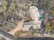 Aerial view of a luxury home with pool, nestled on a rocky hillside at 13512 N Granite Way, Fountain Hills, AZ 85268