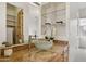 Bathroom with glass vessel sink and built-in shelves at 13512 N Granite Way, Fountain Hills, AZ 85268