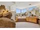 Bathroom with large bathtub, dual sinks, and rock feature at 13512 N Granite Way, Fountain Hills, AZ 85268