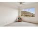 Bedroom with mountain views and a comfortable chair at 13512 N Granite Way, Fountain Hills, AZ 85268