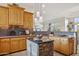 Spacious kitchen features granite countertops and wood cabinets at 13512 N Granite Way, Fountain Hills, AZ 85268