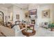 Light and airy living room with fireplace and seating area at 13512 N Granite Way, Fountain Hills, AZ 85268