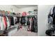 Walk-in closet featuring ample storage space for shoes, clothes and accessories at 13855 S 181St Ave, Goodyear, AZ 85338