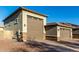 Spacious three-car garage, offering plenty of parking and storage space for vehicles and equipment at 13855 S 181St Ave, Goodyear, AZ 85338