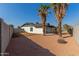 View of backyard with gravel and trees at 1413 N Sunview Pkwy, Gilbert, AZ 85234