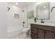 Updated bathroom, featuring a bathtub and vanity at 1413 N Sunview Pkwy, Gilbert, AZ 85234