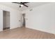 Well-lit bedroom with closet and ceiling fan at 1413 N Sunview Pkwy, Gilbert, AZ 85234